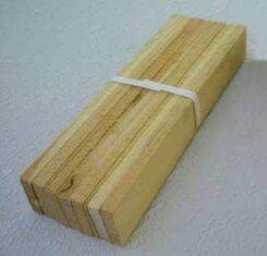 14 Mini Cedar Shims in a pack with a white plastic band