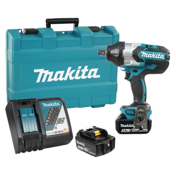 Makita 3/4" Impact Wrench, 2 Makita batteries, Makita charger, and carrying case