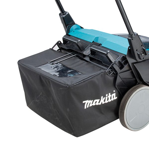 A view from the back of the Makita VS001GZ 40V Cordless XGT Vacuum Sweeper showing the right wheel and the collection bag