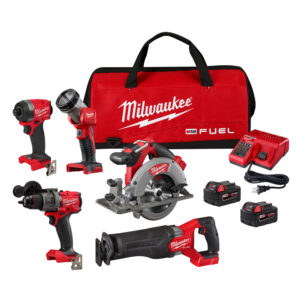 Milwaukee M18 FUEL 5-tool combo kit with hammer drill, impact driver, SAWZALL reciprocating saw, 6-1/2 inch circular saw, LED work light, two M18 XC5.0 batteries, charger, and red Milwaukee tool bag on white background.