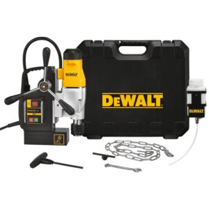 DeWALT magnetic drill press with yellow motor housing and black magnetic base, control panel with power and overload switches, three feed handles, coiled power cord, hard carrying case with DeWALT logo, magnetic coolant bottle with clear hose, safety chain, wrench, hex key, and removable handle laid out on a white background.