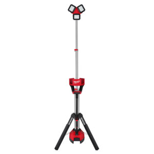 MILWAUKEE M18 ROCKET tower light extended on tripod legs showing three pivoting LED light heads, telescoping mast, and battery base on white background