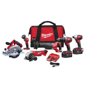 MILWAUKEE 2696-26 M18 cordless 6-tool combo kit including hammer drill, impact driver, SAWZALL reciprocating saw, 6-1/2 inch circular saw, angle grinder, LED work light, two M18 batteries, charger, and contractor bag displayed on white background