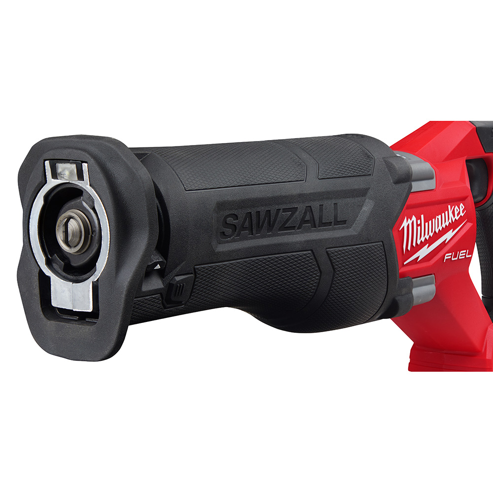 Milwaukee M18 FUEL Sawzall reciprocating saw front housing close up showing blade clamp, rubber overmold grip texture, and SAWZALL branding on tool body