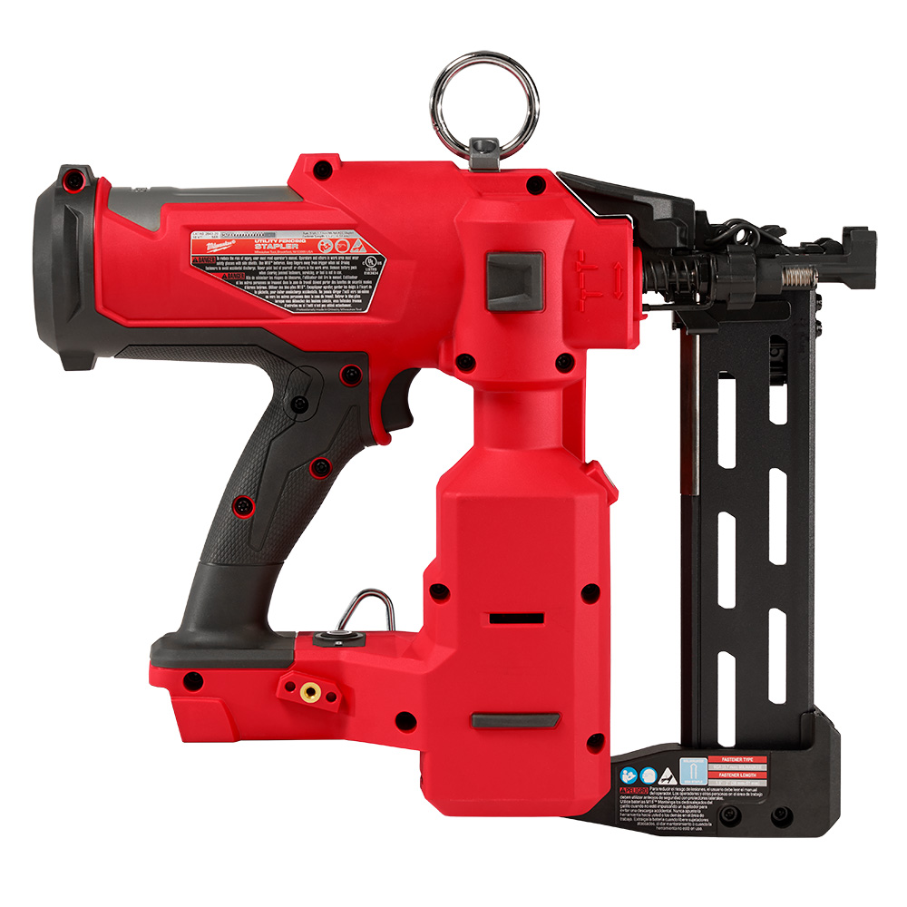 Milwaukee M18 FUEL utility fencing stapler shown in right side profile with exposed staple drive mechanism, depth adjustment markings, integrated lanyard ring, rubberized handle, and 9-gauge staple magazine, battery not installed.
