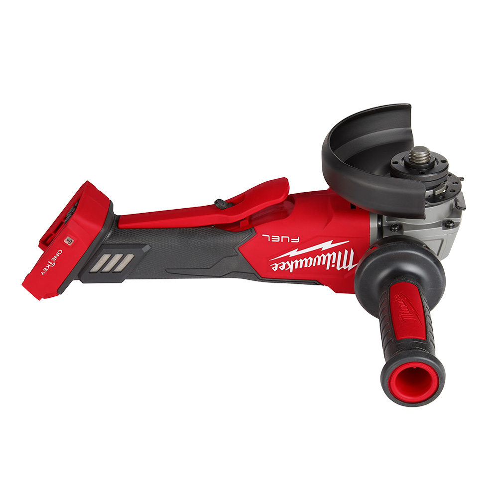 Milwaukee M18 FUEL 4-1/2″ / 5″ cordless braking grinder with ONE-KEY, paddle switch, and side handle shown upside down with guard installed, no battery attached, isolated on white background