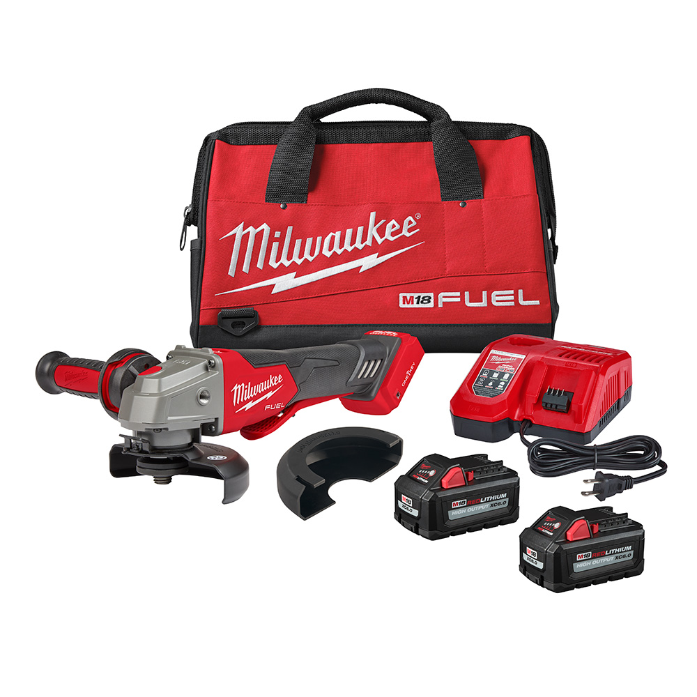 Milwaukee M18 FUEL 4-1/2 inch / 5 inch braking grinder kit with paddle switch, two M18 REDLITHIUM HIGH OUTPUT XC6.0 batteries, M18 and M12 rapid charger, T27 guard, side handle, and red Milwaukee M18 FUEL soft carrying bag on white background.