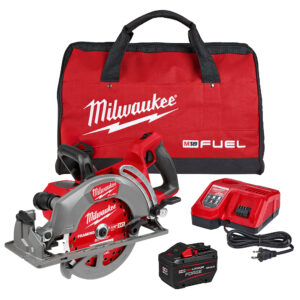 Milwaukee 2930-21HD M18 FUEL 7-1/4 inch rear handle circular saw kit with red saw, 24T framing blade installed, M18 REDLITHIUM FORGE battery, rapid charger, and red Milwaukee M18 FUEL contractor tool bag on white background.