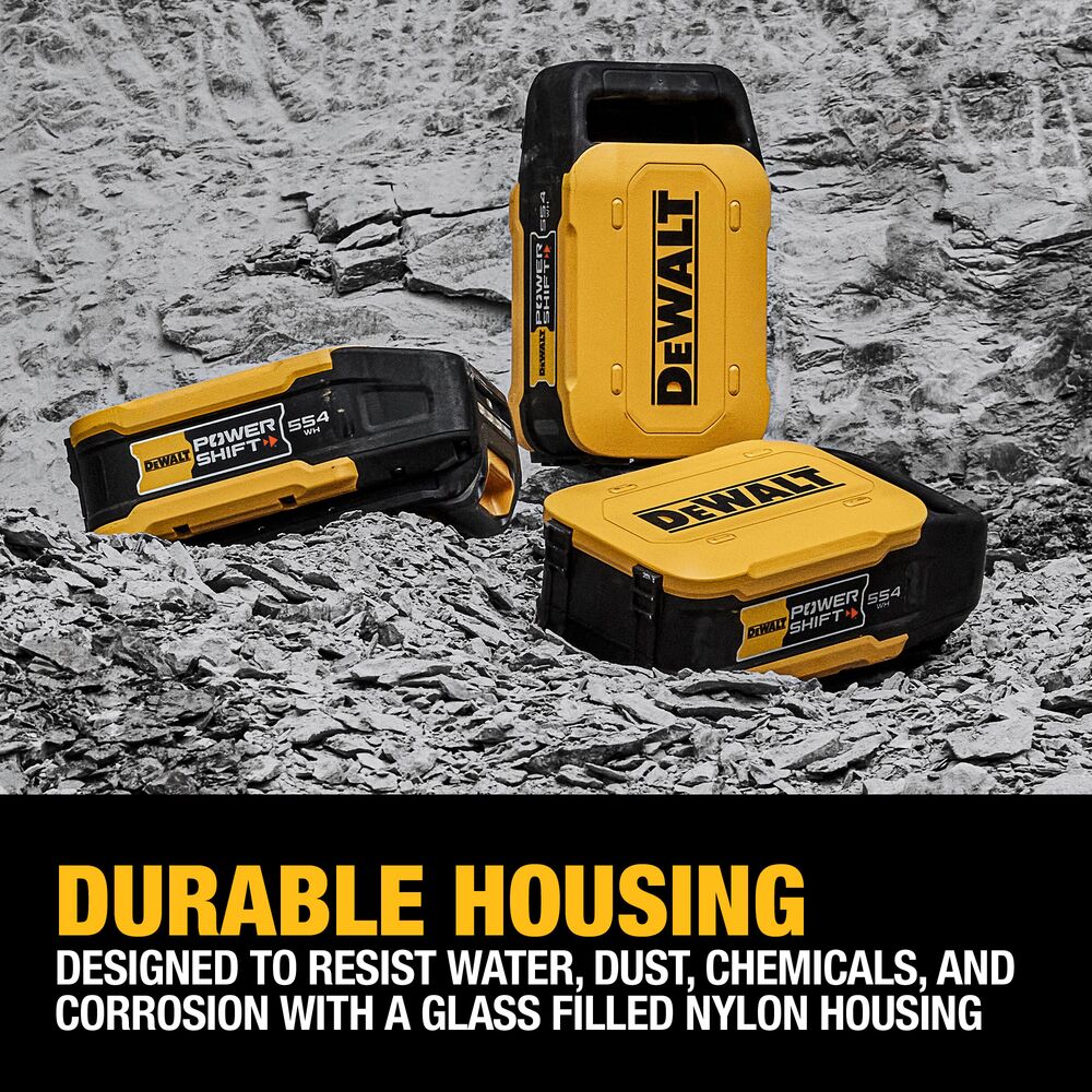 DEWALT DCBPS0554 POWERSHIFT 554Wh Battery multiple units on rocky jobsite surface showing durable housing design with text “designed to resist water, dust, chemicals, and corrosion with a glass filled nylon housing”