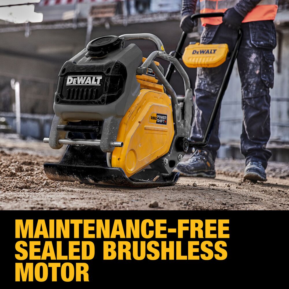 DEWALT POWERSHIFT forward plate compactor in use on soil showing sealed brushless motor housing with “maintenance-free sealed brushless motor” text visible
