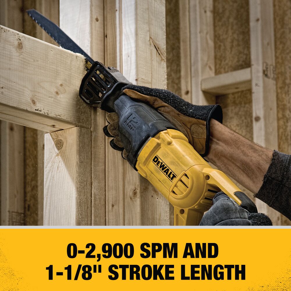 DEWALT DWE305 12 Amp Corded Reciprocating Saw cutting dimensional lumber in a framed wall, highlighting 0-2,900 SPM performance and 1-1/8" stroke length for fast wood-cutting applications.