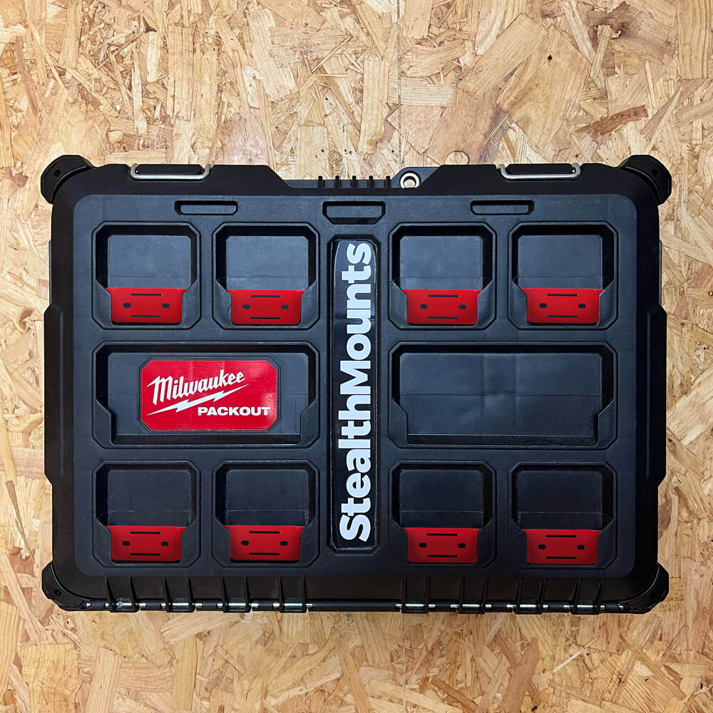 Black StealthMounts mounting feet installed on Milwaukee PACKOUT™ lid for custom tool and accessory mounting