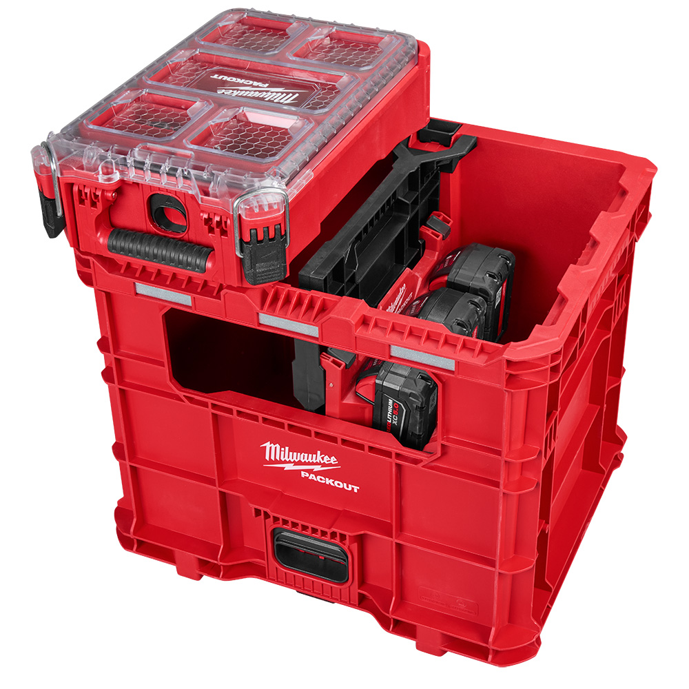 MILWAUKEE PACKOUT XL Crate shown loaded with batteries and a PACKOUT organizer mounted on top, demonstrating quick front access while the storage system remains stacked