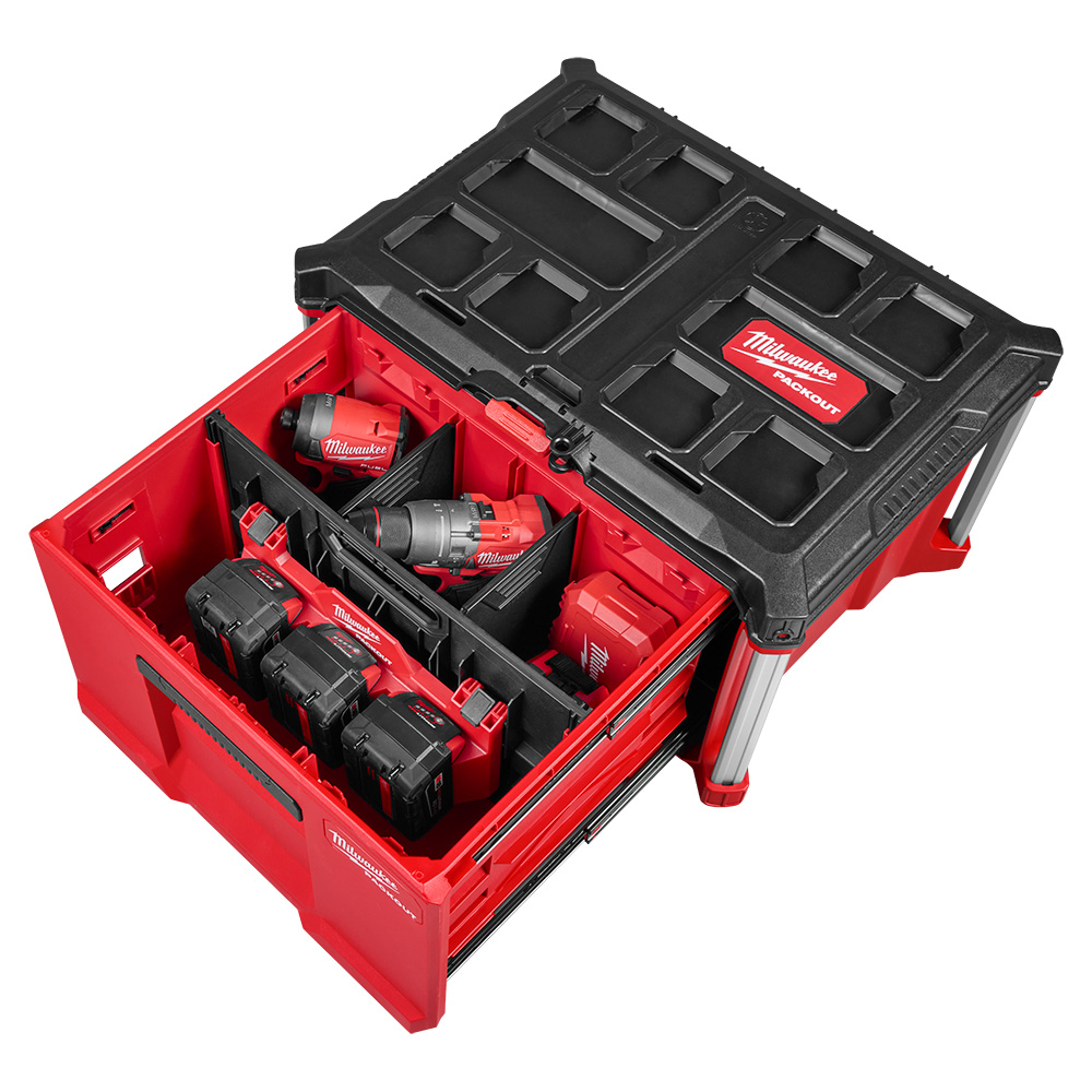 MILWAUKEE PACKOUT Single-Drawer Tool Box shown open and loaded with cordless tools, batteries, and accessories separated by the quick-adjust dividers on a white background.