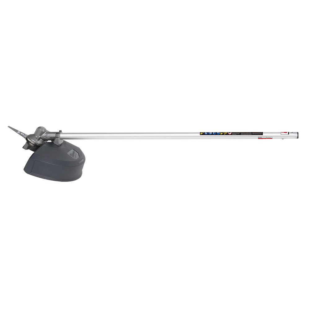 49-16-2738 MILWAUKEE M18 FUEL QUIK-LOK Brush Cutter Attachment shown from the side on a white background, with the full shaft, 9" four-tooth blade, optimized guard, safety labels, and attachment coupling visible.